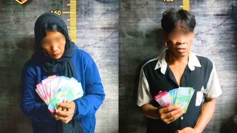 Aksi nekat pasangan suami istri (pasutri) warga Pontianak berakhir di tangan polisi. SH (41) dan NL (40) tertangkap basah setelah mencoba membeli sembako dengan menggunakan uang mainan di sebuah toko sembako yang berlokasi di Desa Kapur, Kecamatan Sungai Raya, Kabupaten Kubu Raya, Senin (18/8/2025). - TBNEWS Polres Kubu Raya