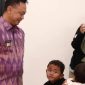 Pemerintah Kota Pontianak melaksanakan Program Cek Kesehatan Gratis (CKG) di sekolah-sekolah sebagai bagian dari delapan Program Hasil Terbaik Cepat Presiden dan Wakil Presiden untuk mendukung Indonesia Emas 2045. Program ini terdiri dari CKG Ulang Tahun, CKG Sekolah, dan CKG Khusus. - foto Pemkot Pontianak