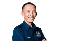 Sosok Hariman Ibrahim, Wakil Ketua II DPRD Pasangkayu, mendadak menjadi sorotan publik setelah videonya gelagapan membaca teks UUD 1945 saat upacara Hari Kesaktian Pancasila viral di media sosial. - foto istimewa